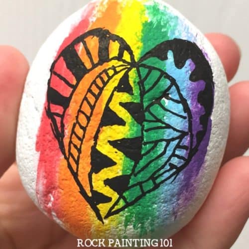 Rainbow Heart Rock with Zentangle style techniques. Create a fun blended rainbow background and then paint your rock with a zentangle heart!