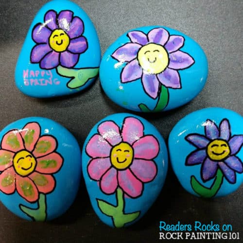 These happy flower rocks are an easy flower painting idea that works perfectly on rocks! I can just imagine the smile on someones face when they find this fun stone painting idea.