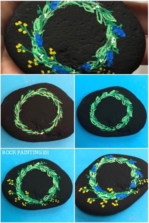This spring wreath painted rock is a fun and simple! Check out how to draw a wreath with paint pens and be amazed at how simple this stone painting idea is! #springwreath #paintedrocks #springrocks #howtodrawawreath #rockpaintingideasforspring #stonepaintingforbeginners #rockpainting101