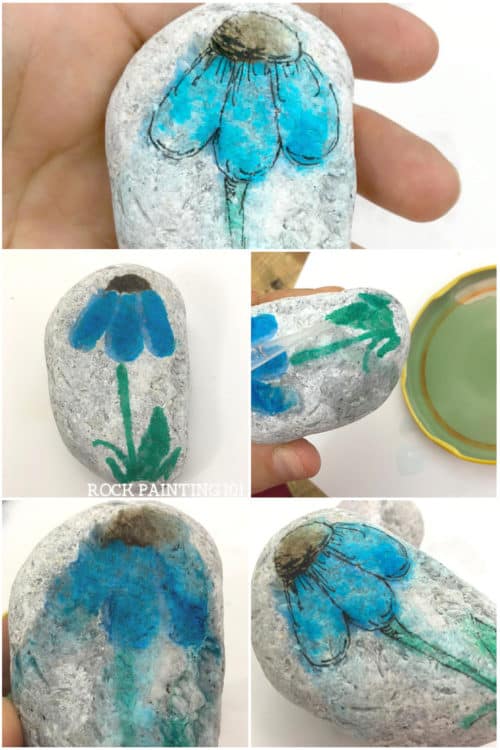A washed out painting technique that's perfect for rock painting or a beginner art project. This technique uses materials you probably have around the house. You don't even need to own expensive water colors or paint pens! #watercoloreffect #washedoutpainting #howtopaintrocks #rockpaintingtechniques #rockpaintingideas #stonepainting #paintedpebbles #flowerrocks #springrockpainting #rockpainting101