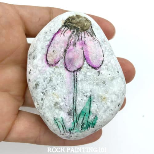 A washed out painting technique that's perfect for rock painting or a beginner art project. This technique uses materials you probably have around the house. You don't even need to own expensive water colors or paint pens!