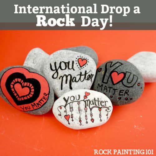 Are you participating in International Drop A Rock Day? Check out all the fun details about this fun day that takes rock hunting to a new level by spreading love and kindness around the world. #internationaldroparockday #droparock #kindnessrocks #youmatter #redheart #howtopaintrocks #rockpainting101