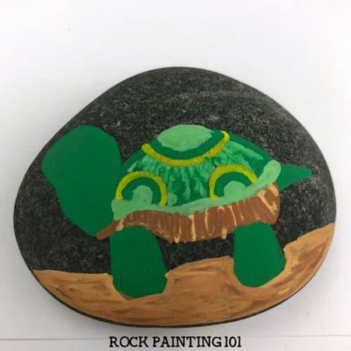 Learn how to paint a turtle on rocks with this simple video tutorial. Grab your paint pens or your favorite paint brush and let's dig into this fun stone painting idea. #turtle #rocks #stone #rockpainting #howtopaint #posca #cuteanimalart #rockpainting101