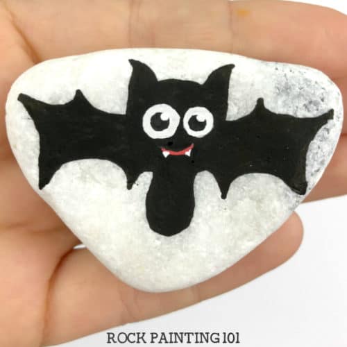 Halloween rock painting ideas. Create fun Halloween painted rocks from fun mummies to friendly monsters. There is a fun stone painting idea for any skill level. Check out the candy painted rocks. They're adorable! #halloween #rockpaintingideas #monsters #mummy #candy #stonepainting #rockpainting101