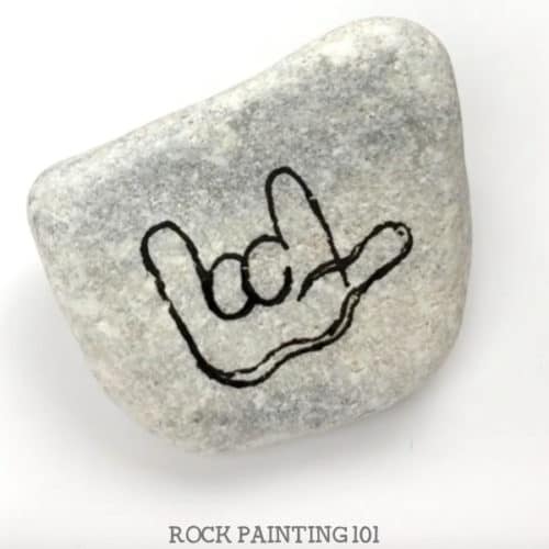 This fun Thanksgiving Rocks turkey painted rock is perfect for giving this holiday season. Brighten someone's day or use it to decorate your holiday table. It's a quick and simple video tutorial. #thanksgivingrocks #turkey #paintedrock #thanksgivingrockpaintingideas #stonepainting #rockart #thanksgivingdecor #thanksgivingcraft #rockpainting101