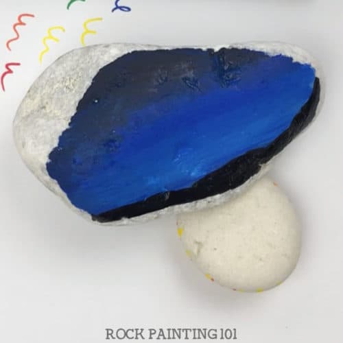 Create a beautiful nativity scene on your painted rocks with this step by step tutorial. This Christmas rock painting idea is perfect for stocking stuffers, Christmas decor, or hiding this season. #nativity #christmas #rockpainting #paintedrocks #stockingstuffer #rockpainting101