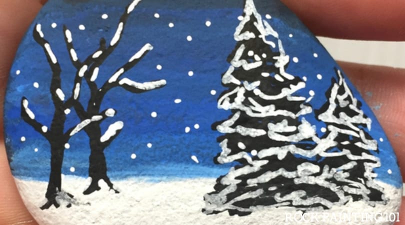 How to make this beautiful winter scene rock painting idea