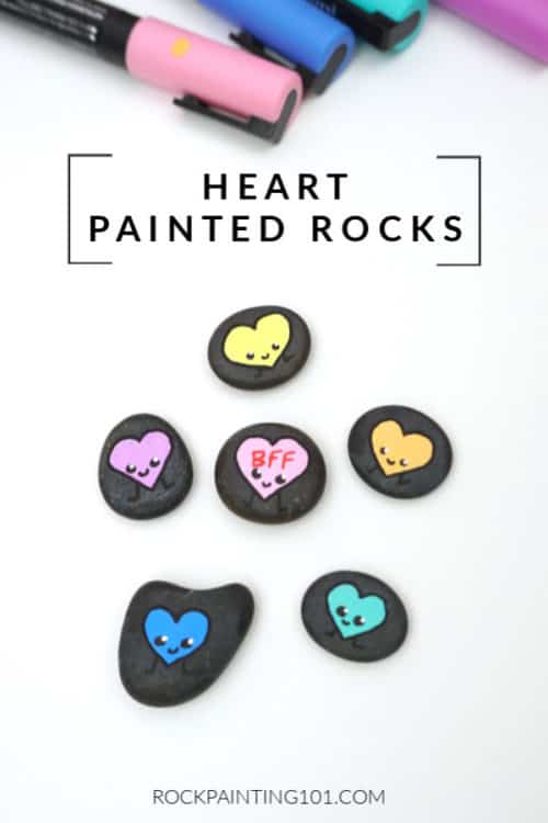 Paint these simple smiling hearts onto rocks and you have an adorable Valentine's Day rock painting idea! #rockpainting101