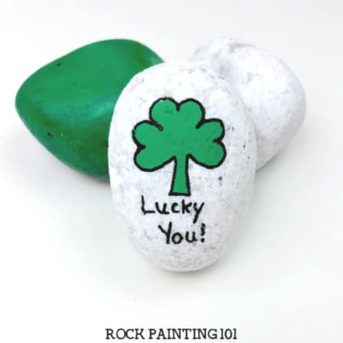 Step-by-step directions to paint a shamrock. A simple St. Patrick's Day rock painting idea.