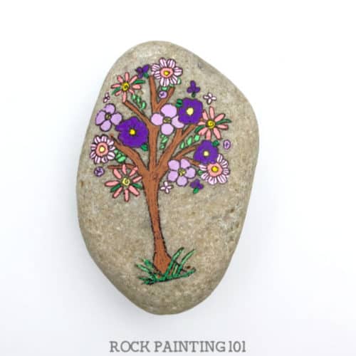 This Flower filled tree is the perfect rock to paint for spring.