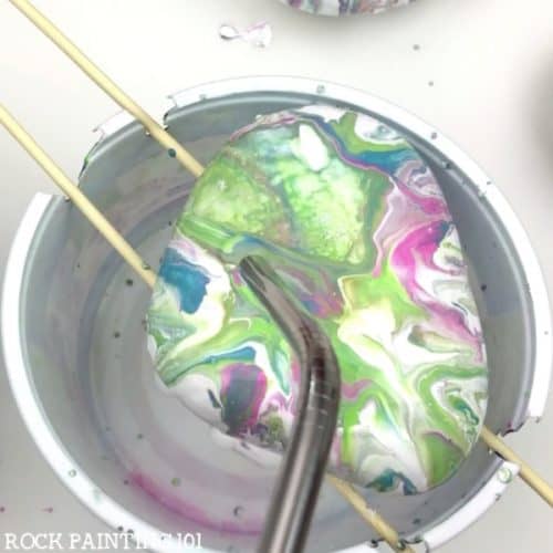 These tips will help you save paint while pour painting on rocks. Create beautiful results while using less paint. Which means you can create more painted rocks!