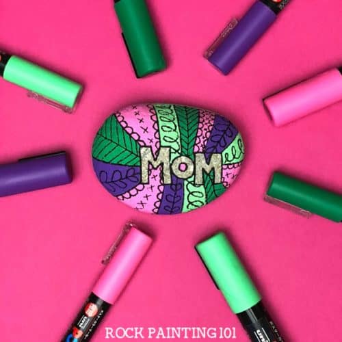 Use Scandinavian pattern designs for rock painting. This rock is perfect for Mother's Day.