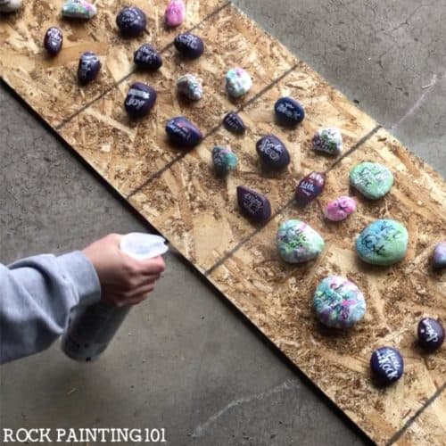 Learn how to seal painted rocks with these simple techniques. There are a lot of different variables that go into properly sealing your painted rocks. These tips and step by step instructions will break it down so you can paint rocks for outdoors. #rockpainting101