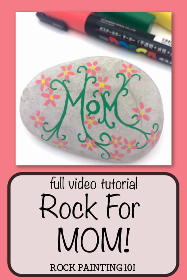 These painted vines with flowers are the perfect start to this mother's day rock design.