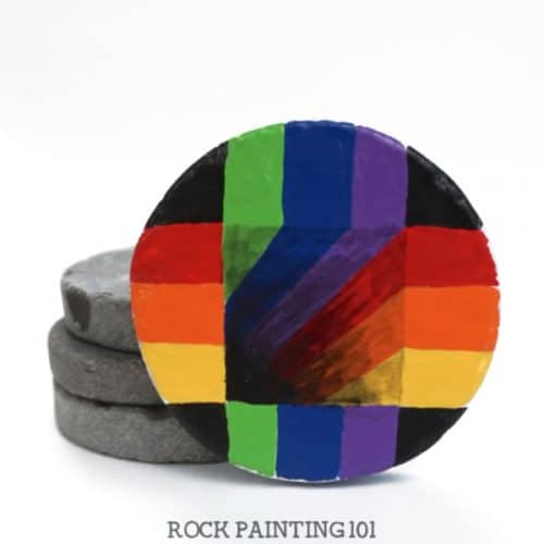 learn how to make optical illusions on rocks with this rainbow op art step by step tutorial