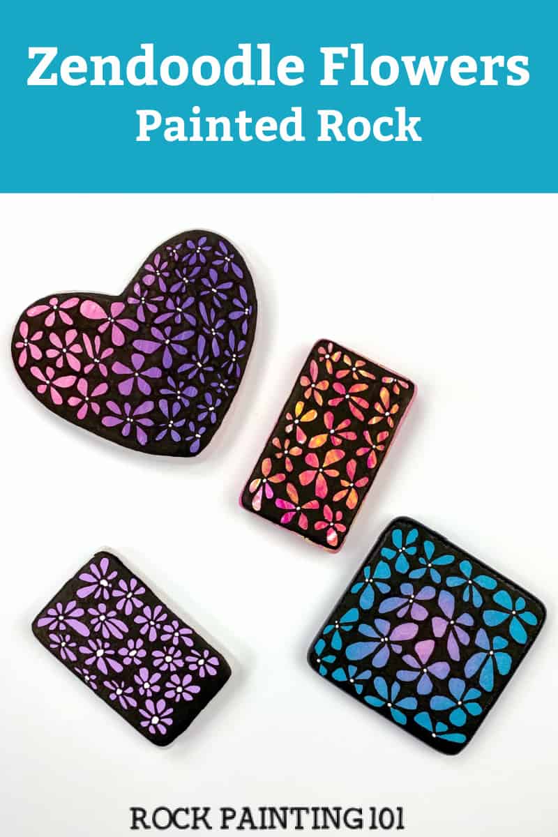 Create beautiful zendoodle style flower painted rocks with this step by step tutorial. Use this rock painting idea to decorate, give as gifts, or hide around your city. #rockpainting101 #zendoodle #flowers #paintedrocks