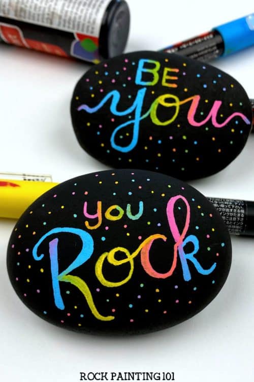 Colorful word rocks with paint pens