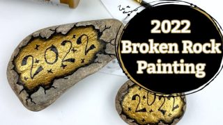 2022 broken new years rock painting design